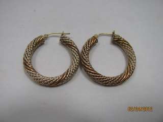 14 Kt Gold earrings marked 5.6 grams  