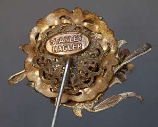   VINTAGE STANLEY HAGLER RHINESTONE ADORNED GOLDTONE STICK PIN  