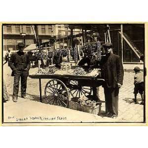 Street vender,Italian feast,cart of dries food & nuts,New York,NY,1908 