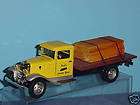 1934 FORD BB 157 LUMBER TRUCK 1:24 YELLOW WEATHERED  