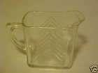 small clear glass pitcher  
