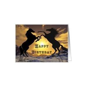 Mighty stallions rearing and fighting on this stunning birthday card 
