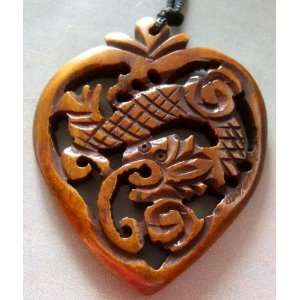   Bone Carved Mythical Celestial Dragon Heart Pendant 