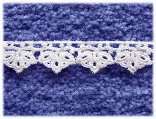 Lovely intricate venise lace that is rayon machine embroidered with a 