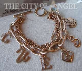 NWT Guess Gold Tone Triple Chain Dangle Charms Toggle Clasp Bracelet 