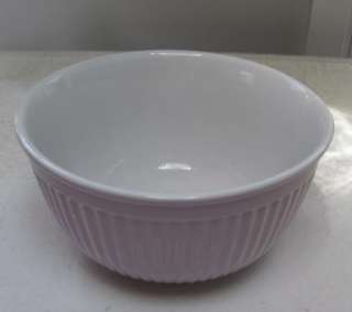   Mixing & Serving Bowl. The inside is white & the outside has a