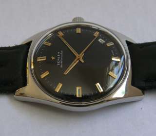 Black dial signed Zenith Automatic Swiss   Golden Batons and matching 