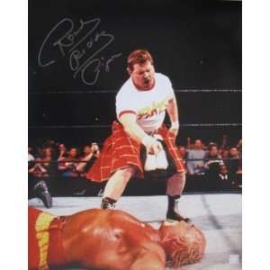  Rowdy Roddy Piper Signed WWE 16x20   Over Hulk Hogan 