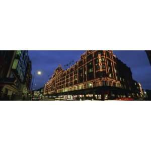 Buildings Lit Up at Night, Harrods, London, England Photographic 